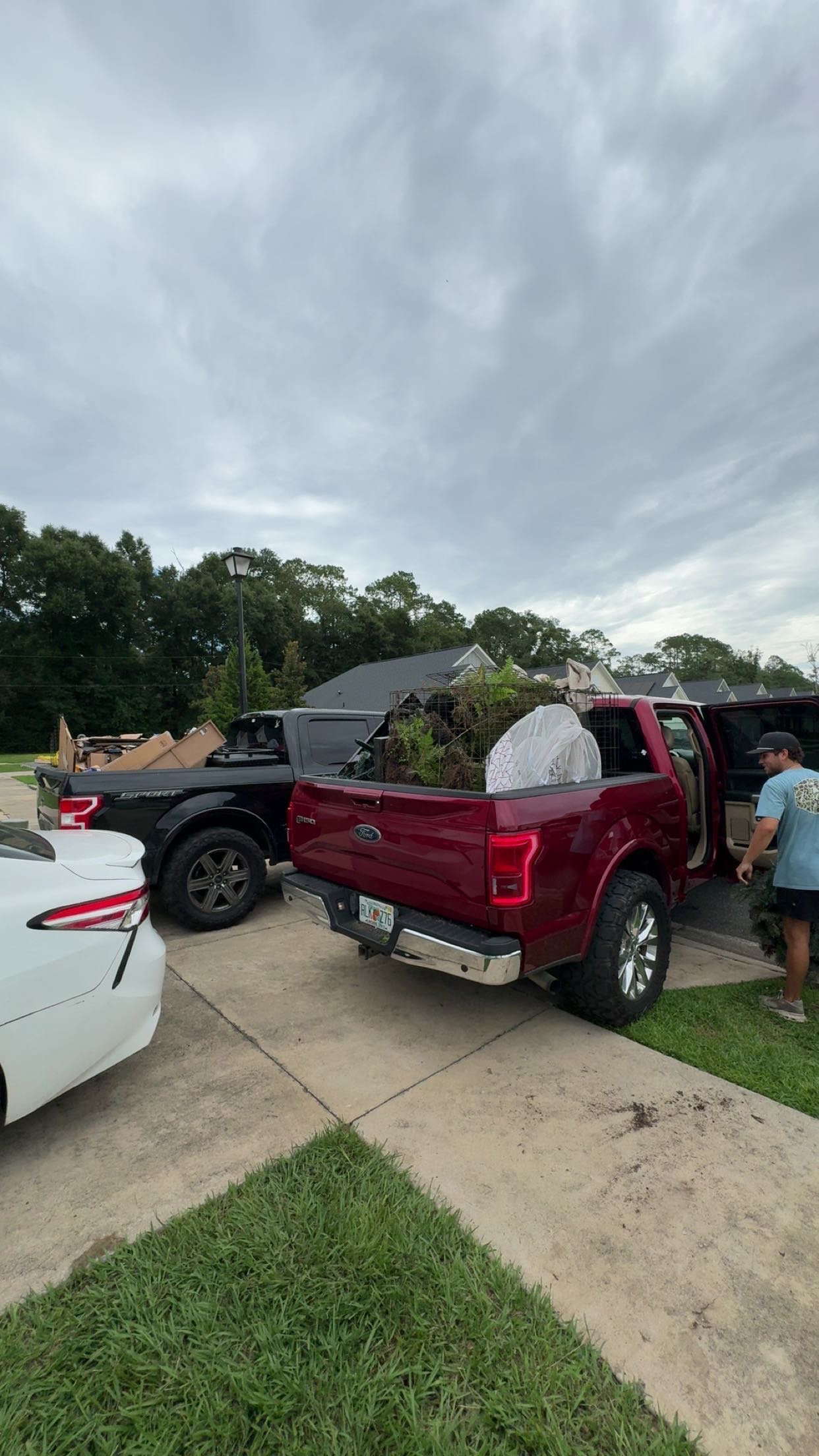 Pickup trucks loaded with junk for hauling